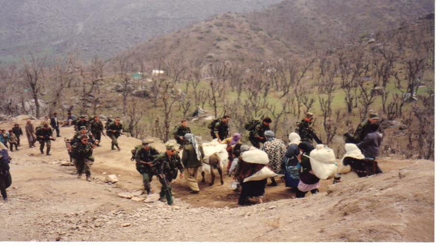 Photo above: U.S. Special Forces team (ODA 013) in Kurdish Refugee Camp, Isikveren, Turkey, April 1991.