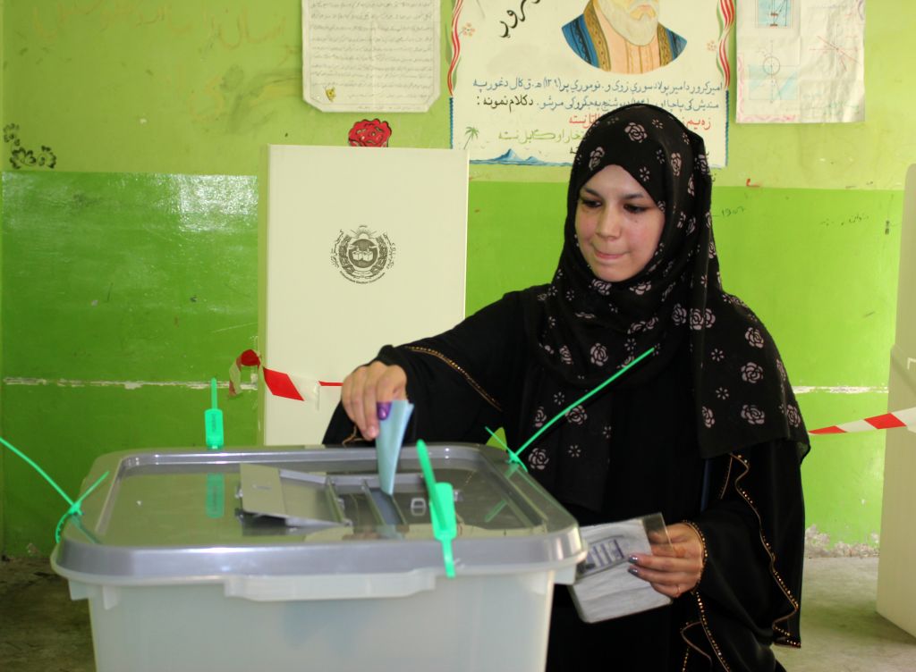 Afghan woman casts his vote at a polling station during the presidential elections in Kabul, Afghanistan on September 28, 2019. 