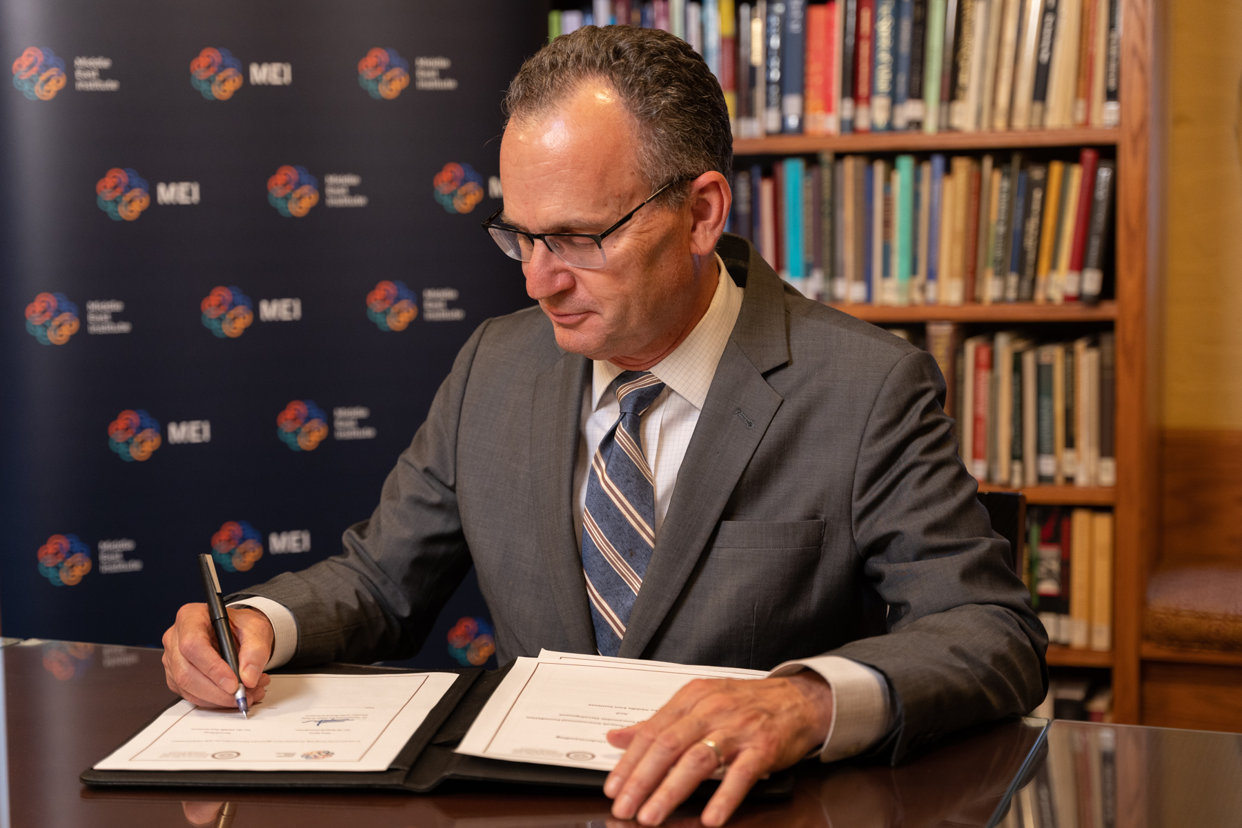 Paul Salem signing memorandum of understanding