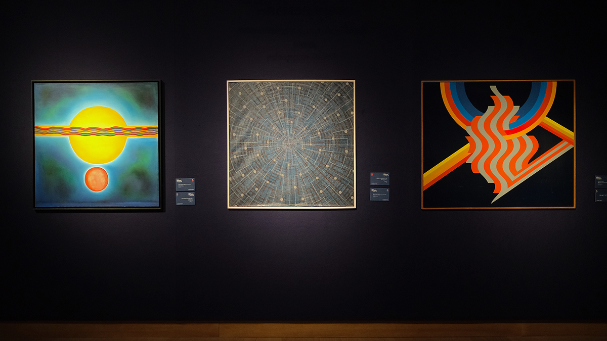 Lebanese painter Samia Osseiran Jumblatt’s 1970 painting Formative Radiation, Egyptian artist Menhat Helmy’s 1973 oil on canvas Space Exploration/Universe, and Moroccan artist Mohammed Melehi untitled 1975 work. Photo by Sueraya Shaheen.