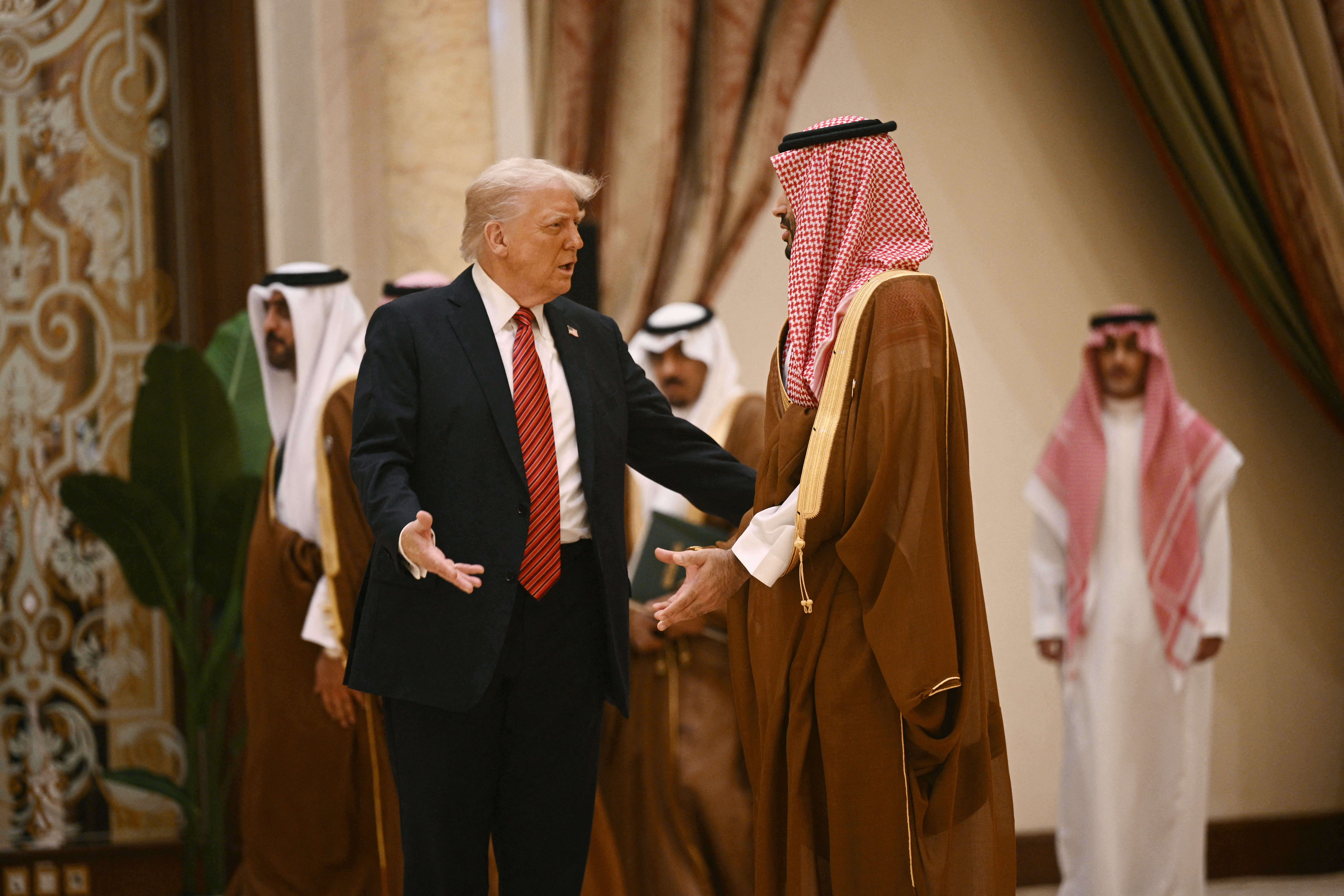 Photo above: President Donald Trump speaks with Saudi Crown Prince Mohammed bin Salman in Riyadh on May 15, 2025. Photo by Brendan Smialowski/AFP via Getty Images.