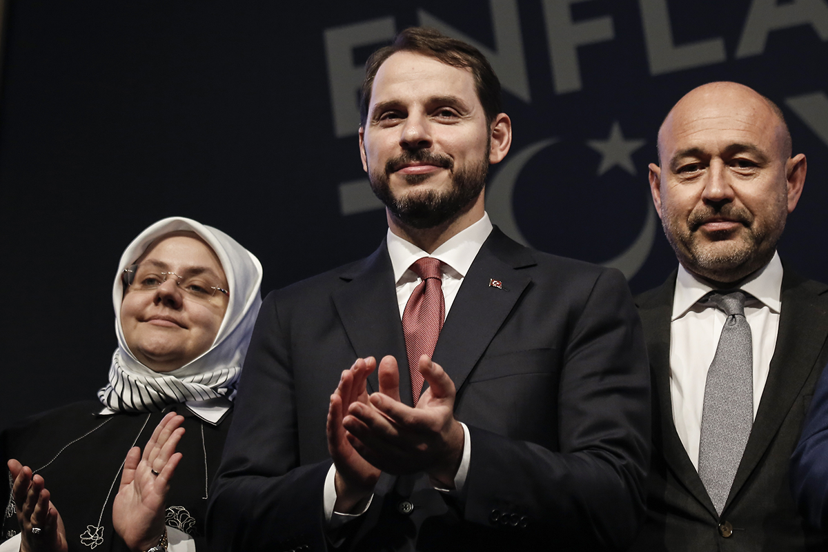 Photo above: Berat Albayrak, Turkey’s Treasury and finance minster, center, applauds following a news conference in Istanbul on October 9, 2018. Photo by Kostas Tsironis/Bloomberg via Getty Images.
