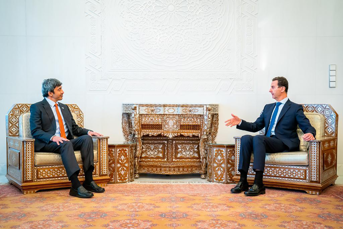 Syrian President Bashar al-Assad (R) meets UAE Minister of Foreign Affairs Abdullah bin Zayed Al Nahyan (L) in Damascus on Nov. 09, 2021. Photo by UAE Ministry of Foreign Affairs/Anadolu Agency via Getty Images.