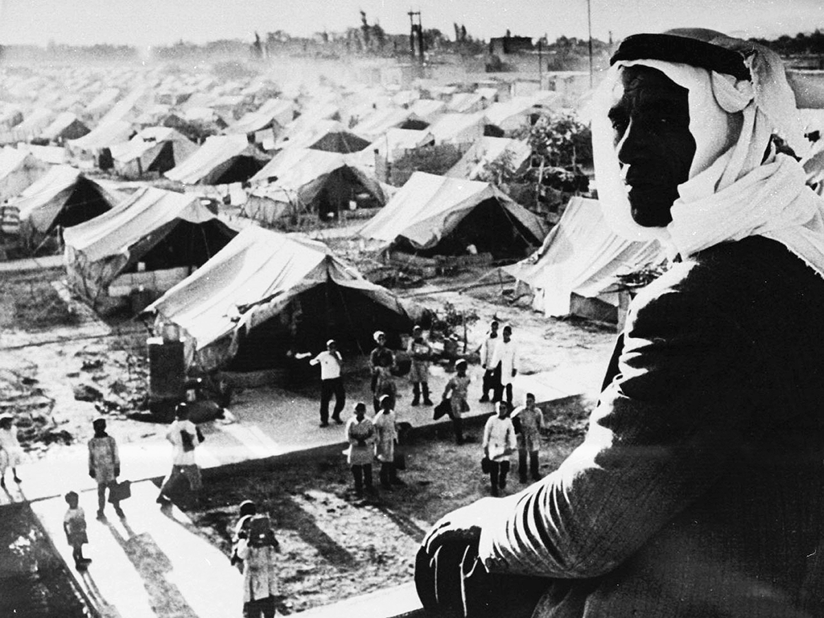 A refugee camp in the Jordan Valley for Palestinians driven from their homes by Israeli forces, 1948. Photo by Pictures From History/Universal Images Group via Getty Images. 