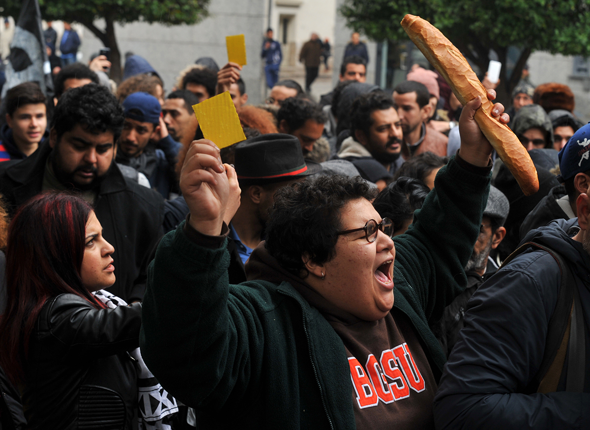 Photo above: Tunisian protesters shout slogans outside the governorate’s offices in Tunis during a demonstration over price hikes and austerity measures on Jan. 12, 2018. Photo by SOFIENE HAMDAOUI/AFP via Getty Images.