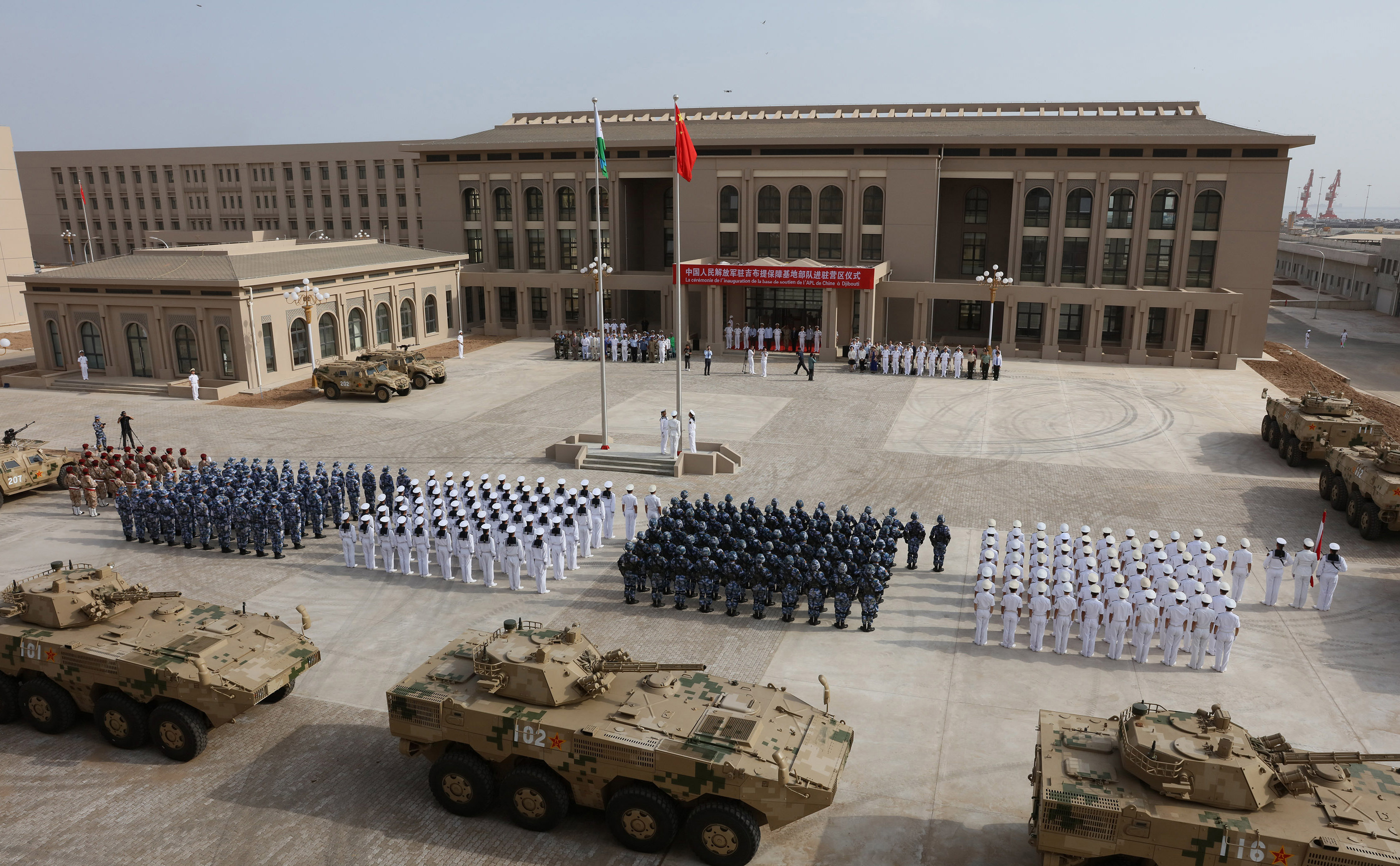 Chinese People's Liberation Army personnel attending the opening ceremony of China's new military base in Djibouti on August 1, 2017. (Photo by STR/AFP via Getty Images)