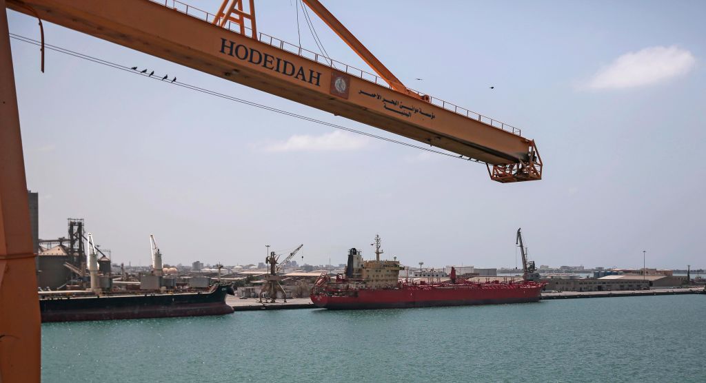 A cargo ship and oil tanker sit docked at the port of Hodeida, on Sept. 29, 2018. Photo by Hani Al-Ansi/picture alliance via Getty Images.