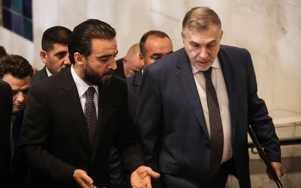 Iraqi Prime Minister Mohammed Tawfiq Allawi arrives at the parliament headquarters ahead of a special session for a confidence vote on the new cabinet members. Photo: Ameer Al Mohammedaw/dpa (Photo by Ameer Al Mohammedaw/picture alliance via Getty Images)