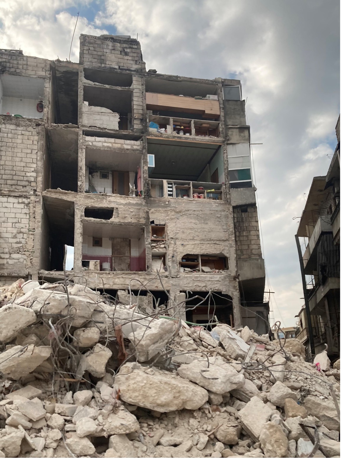 An apartment in the town of Salqin sheared in half. Photo by Gregory Waters.