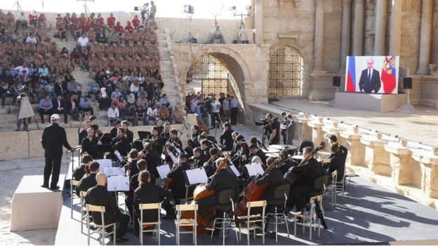 Putin on video link on Palmyra stage