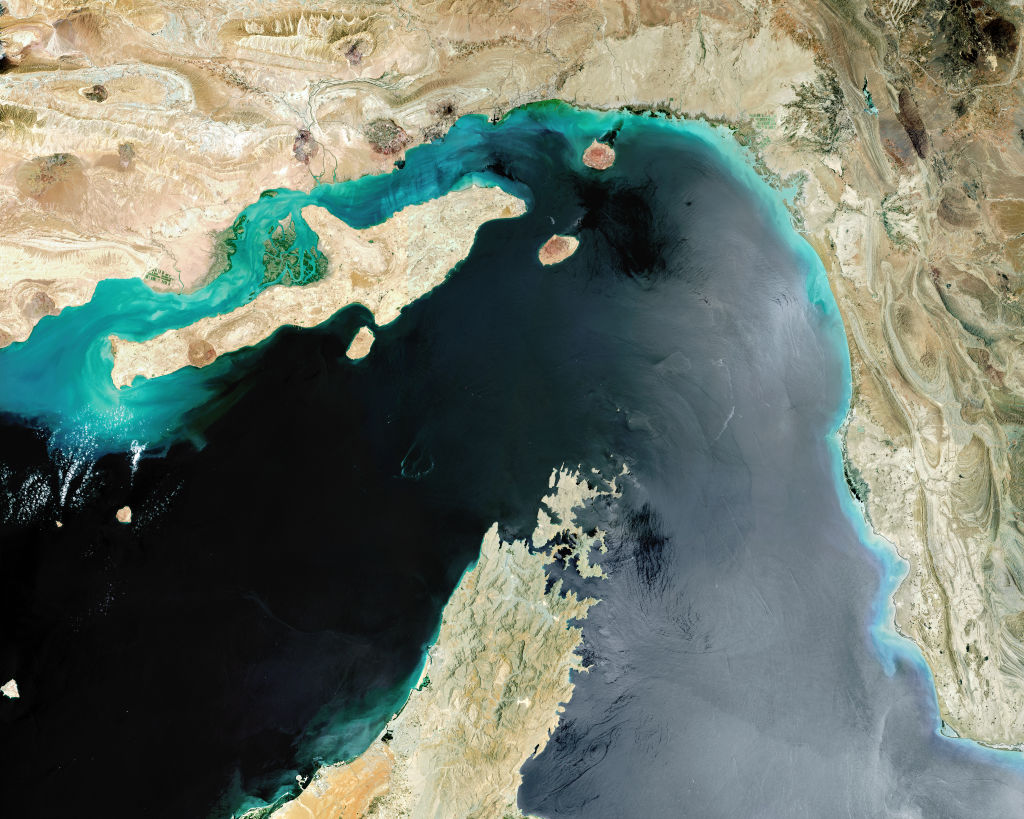Satellite image of the Strait of Hormuz, a strategic maritime choke point with Iran situated at the top with Qeshm Island and the United Arab Emirates to the South. 