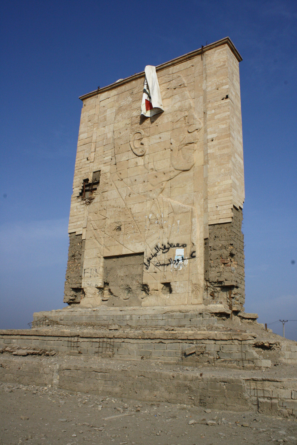 Stone portrait of Saddam Hussein at Babylon
