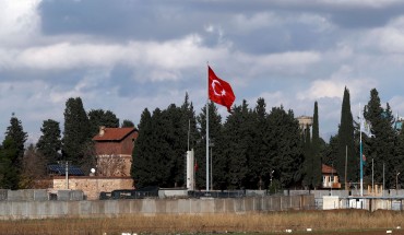 Turkish flag hangs at border with Syria 