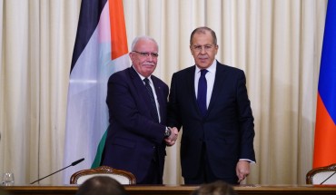 Russian Foreign Minister Sergei Lavrov (R) shakes hand with Palestinian Foreign Minister Riyad al-Malki (L) as they pose for a photo ahead of their press conference in Moscow, Russia on December 21, 2018.