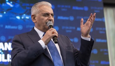 Turkish Prime Minister Binali Yildirim makes a speech during the ribbon-cutting ceremony of insurance firm Allianz's campus in Gaziemir, Izmir, Turkey on April 27, 2018. 