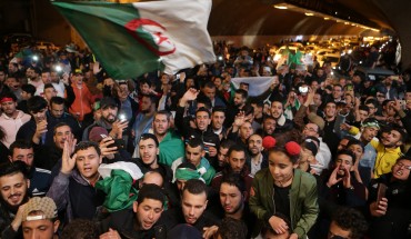 Hundreds of people celebrate during a demonstration after the resignation of Algerian President Abdelaziz Bouteflika, on April 02, 2019 in Algiers, Algeria.