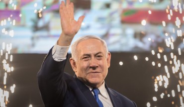  Benjamin Netanyahu, Prime Minister of Israel, beckons supporters after the polling stations have been closed.