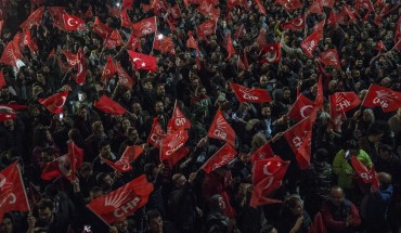 People wait outside of the Republican People's Party (CHP) Headquarters after voting ended for the local elections in Ankara, Turkey on April 01, 2019.