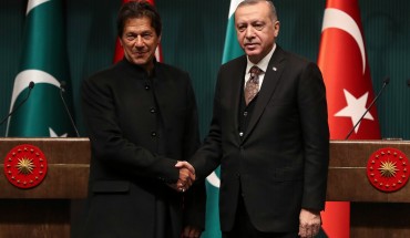 Turkish President Recep Tayyip Erdogan (R) and Pakistani Prime Minister Imran Khan (L) shake hands after a joint press conference at the Presidential Complex in Ankara, on January 4, 2019.