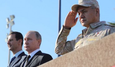 Syria's President Bashar al-Assad, Russia's President Vladimir Putin, and Russia's Defence Minister Sergei Shoigu (L-R) at the Russian Hmeimim air base. 