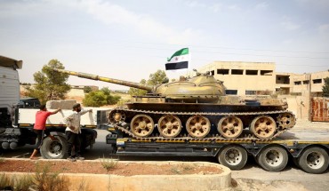 Heavy armoured vehicles of Syrian opposition forces are being withdrawn from Syria's Idlib to complete the establishment of the disarmament field due to the Sochi Agreement, agreed by Turkey and Russia, on October 08, 2018. (Photo by Gokhan Balci/Anadolu Agency/Getty Images)