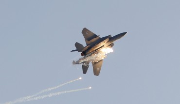 An Israeli F-15 I fighter jet launches anti-missile flares at it performs during a graduation ceremony of Israeli air force pilots at the Hatzerim Air Force base in Israel's Negev desert on December 26, 2018. (Photo by JACK GUEZ / AFP) (Photo credit should read JACK GUEZ/AFP/Getty Images)