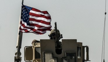 A US military convoy drives on a highway from Kobane to Ain Issa on September 29, 2017.