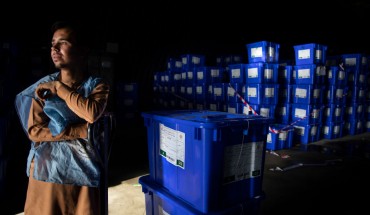  Afghan workers move ballot boxes to trucks getting ready for the Presidential elections in five days in Kabul, Afghanistan on September 23, 2019. 