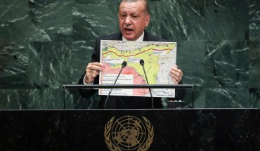 President of Turkey Recep Tayyip Erdogan holds up a map of the safe zone Turkey in in favor of while speaking to the United Nations General Assembly at UN headquarters on September 24, 2019 in New York City. 