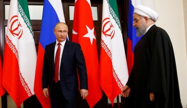 Russian President Vladimir Putin (L) and Iranian President Hassan Rouhani (R) attend the trilateral summit to discuss progress on Syria, between the Presidents of Turkey, Russia and Iran on November 22, 2017 in Sochi, Russia.