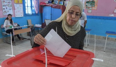 A Tunisian voter casts his ballot for presidential election at a polling station in La Marsa on the outskirts of the capital Tunis, on September 15, 2019.
