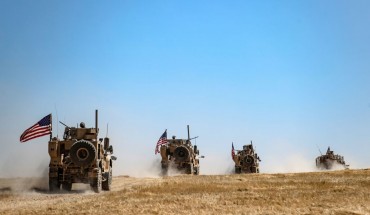 A US military convoy takes part in joint patrol with Turkish troops in the Syrian village of al-Hashisha on the outskirts of Tal Abyad town along the border with Turkish troops, on September 8, 2019.