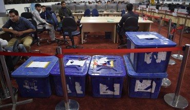 Independent Election Commission (IEC) workers sit at a computer terminal while election information from all over the country is gathered at the Data Centre in Kabul on October 2, 2019. - Voter participation in last weekend's Afghan presidential election will be much less than a third, the country's Independent Election Commission said on October 1, marking a record-low turnout. (Photo by WAKIL KOHSAR / AFP) (Photo by WAKIL KOHSAR/AFP via Getty Images)