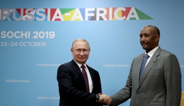 Russias President Vladimir Putin and the Chairman of the Sovereignty Council of Sudan, Abdel Fattah al-Burhan shake hands during a meeting on sidelines of the 2019 Russia-Africa Economic Forum at the Sirius Park of Science and Art.