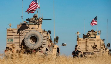 A convoy of US military vehicles drives near the town of Tal Tamr in the northeastern Syrian Hasakeh province on the border with Turkey, on November 10, 2019.