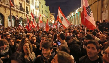  Lebanese demonstrators south slogans in the capital Beirut on December 15, 2019.