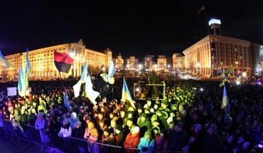 People attend a rally marking the 6th anniversary of the 2014 Euromaidan antigovernment riots at Kiev's Independence Square.