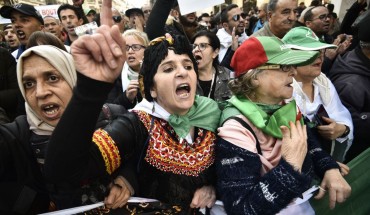 Algerian protesters take part in an anti-government demonstration in the capital Algiers on January 3, 2020. 