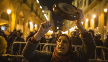 BEIRUT, LEBANON - JANUARY 16: An anti-government protester bangs a pan as they demonstrate ahead of the expected naming of a new cabinet tomorrow by Prime Minister Designate Hassan Diab, on January 16, 2020 in Beirut, Lebanon. "Diab has said he intends to field a cabinet of independent experts, but protesters see his designation as Prime Minister as an extension of the same political establishment they have been rallying against since unrest began last October 17th. (Photo by Sam Tarling/Getty Images)