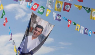 A picture shows election flags displaying imprisoned Selahattin Demirtas, Presidential candidate and leader of People's Democratic Party (HDP) in Ankara, on June 19, 2018.