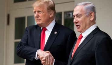 U.S. President Donald Trump and Prime Minister of Israel Benjamin Netanyahu shake hands while walking through the colonnade prior to an Oval Office meeting at the White House March 25, 2019 in Washington, DC. 