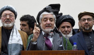 Afghan presidential election opposition candidate Abdullah Abdullah (C) gestures as he takes part in a press conference after the announcement of the final presidential elections results at the Sapedar Palace in Kabul on February 18, 2020. 