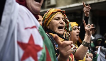 Algerians chant slogans as they take part in an anti-government demonstration in the center of the capital Algiers on January 10, 2020. 