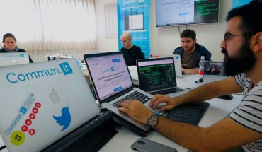 Engineers from the Israeli company "Commun.it" use their expertise in social media commercial analysis to identify networks of fake users, at their offices in the Israeli city of Bnei Brak near Tel Aviv on January 23, 2019.