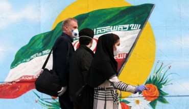 Citizens wear medical masks and gloves as a precaution against coronavirus (COVID-19) on March 01, 2020 in Tehran, Iran. 