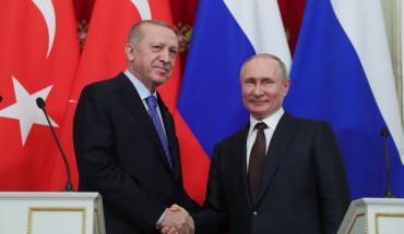 President of Turkey Recep Tayyip Erdogan (L) and President of Russia Vladimir Putin (R) shake hands at the end of a joint news conference following an inter-delegation meeting at Kremlin Palace in Moscow, Russia on March 5, 2020.