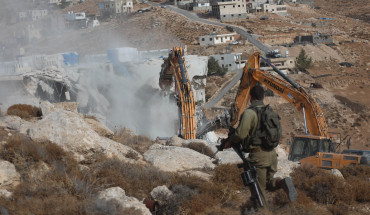 MIDEAST-HEBRON-HOUSE-DEMOLITION  Israeli bulldozers demolish a Palestinian house, which is believed to have been built without permit, in Bani Naim town near the West Bank city of Hebron, Oct. 25, 2022. (Photo by Mamoun Wazwaz/Xinhua via Getty Images)