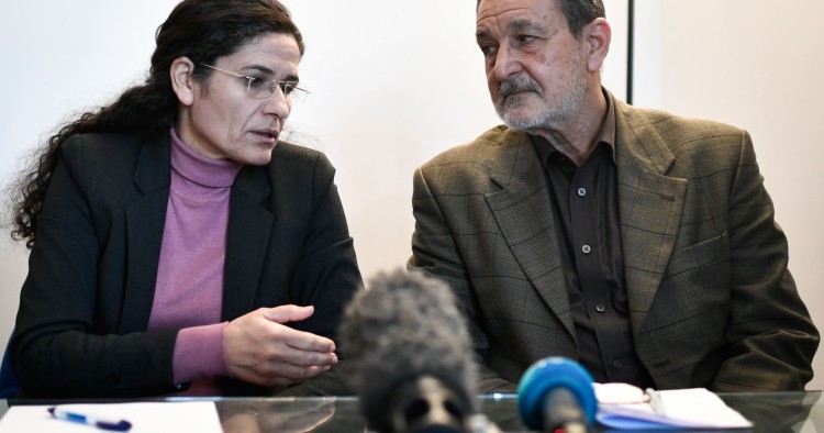 Two top political leaders of the Syrian Kurdish alliance and co-chairs of the Syrian Democratic Council Riad Darar (R) and Ilham Ahmed (L) speak together while delivering a speech during a press-conference, in Paris, on December 21, 2018.