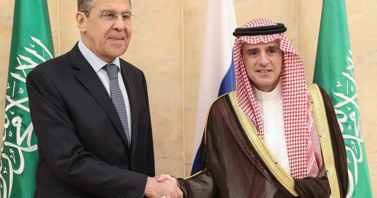 Russia's Foreign Minister Sergei Lavrov and Saudi Arabia's Foreign Minister Adel al-Jubeir shake hands during a meeting in Riyadh.