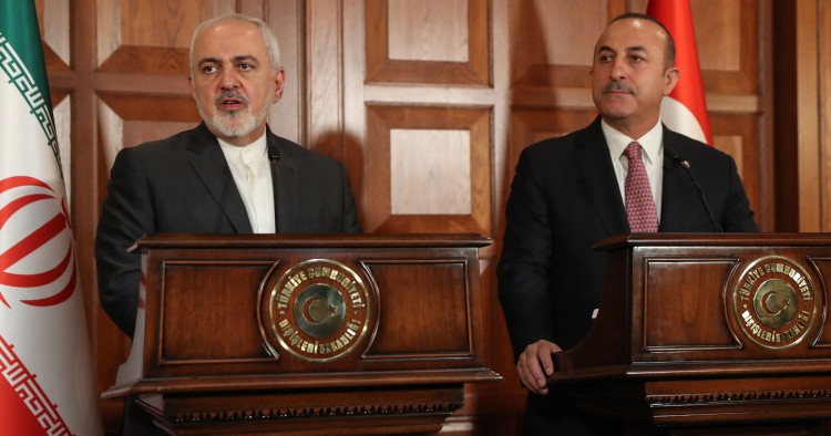 Turkish Foreign Minister Mevlut Cavusoglu (R) and Iranian Foreign Minister Mohammad Javad Zarif (L) give a press conference in Ankara, Turkey, on April 17, 2019.
